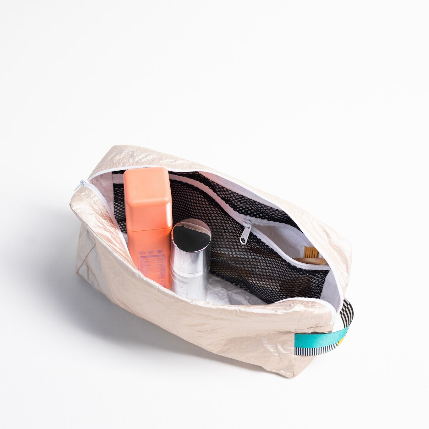 NOMI kosmetická taštička černá : barevný popruh